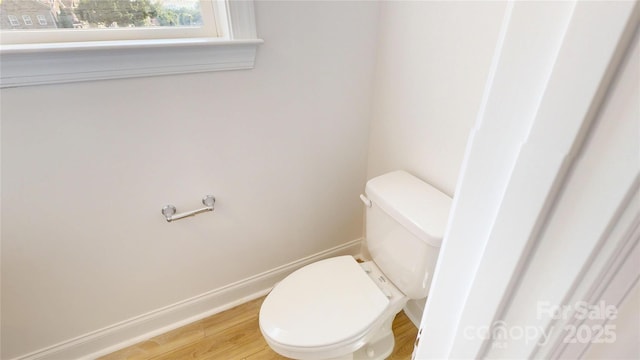 2143 Barrowcliffe Dr NW, Concord, NC 28027 - bathroom featuring toilet and wood finished floors