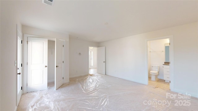 2143 Barrowcliffe Dr NW, Concord, NC 28027 - unfurnished bedroom with ensuite bath and baseboards