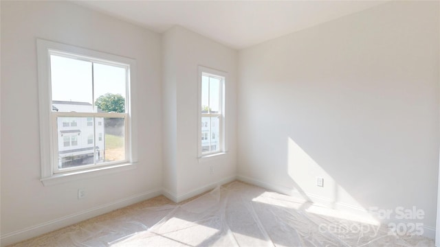 2143 Barrowcliffe Dr NW, Concord, NC 28027 - carpeted spare room with healthy amount of natural light