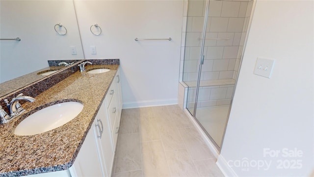 2143 Barrowcliffe Dr NW, Concord, NC 28027 - bathroom featuring double vanity and a shower stall