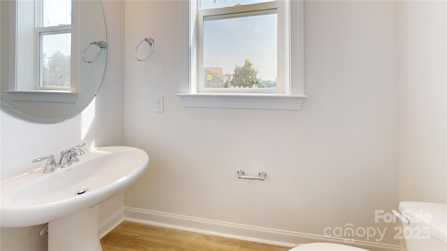 2143 Barrowcliffe Dr NW, Concord, NC 28027 - half bath featuring plenty of natural light and wood finished floors