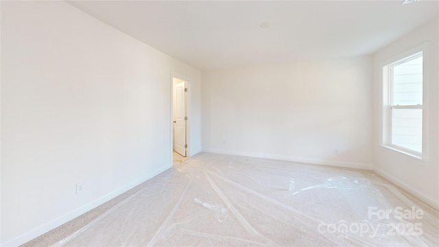 2143 Barrowcliffe Dr NW, Concord, NC 28027 - unfurnished room with light colored carpet and baseboards
