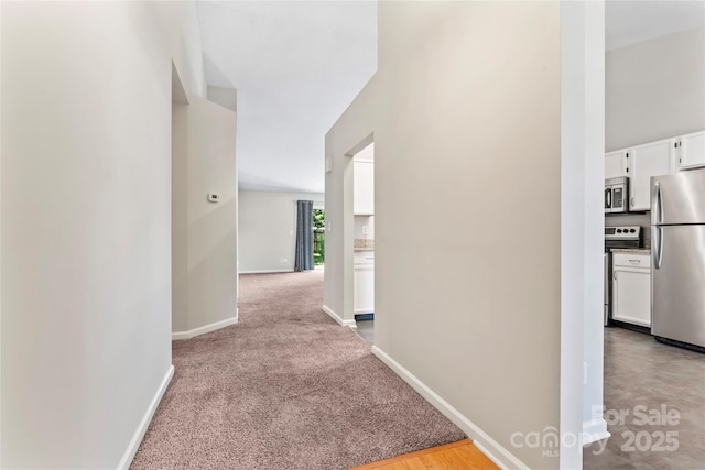 8724 Tweedsmuir Glen Ln, Charlotte, NC 28215 - hall featuring baseboards and light carpet