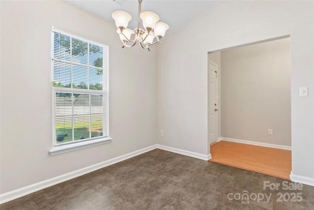 8724 Tweedsmuir Glen Ln, Charlotte, NC 28215 - unfurnished room featuring a chandelier and dark carpet