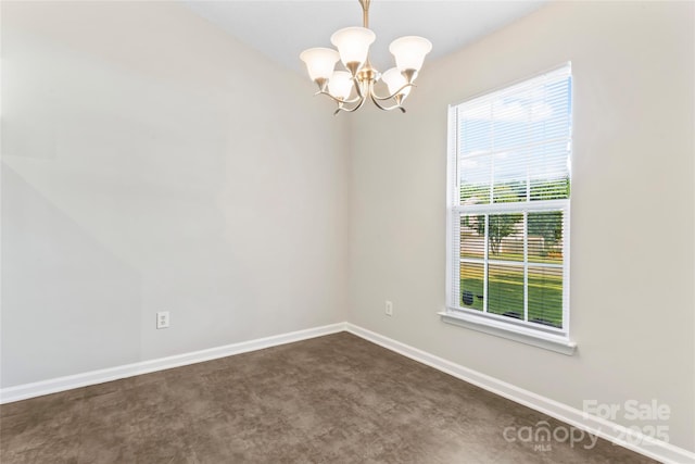 8724 Tweedsmuir Glen Ln, Charlotte, NC 28215 - unfurnished room with a chandelier and dark carpet