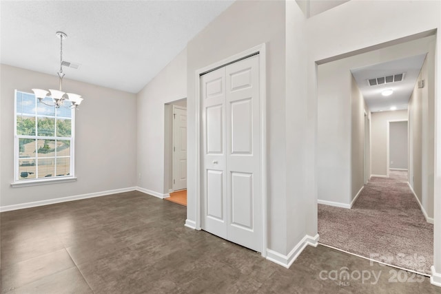 8724 Tweedsmuir Glen Ln, Charlotte, NC 28215 - hall featuring a chandelier and lofted ceiling