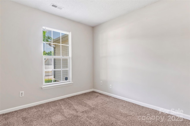 8724 Tweedsmuir Glen Ln, Charlotte, NC 28215 - empty room featuring carpet flooring and baseboards