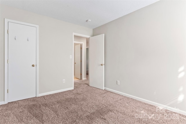 8724 Tweedsmuir Glen Ln, Charlotte, NC 28215 - unfurnished bedroom with carpet flooring and baseboards