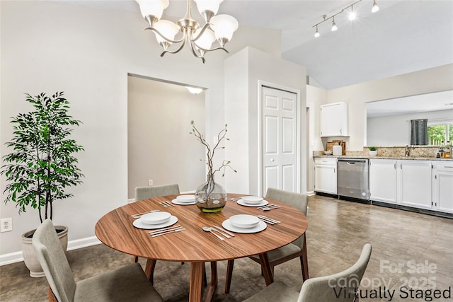 8724 Tweedsmuir Glen Ln, Charlotte, NC 28215 - dining space with a chandelier, lofted ceiling, and rail lighting