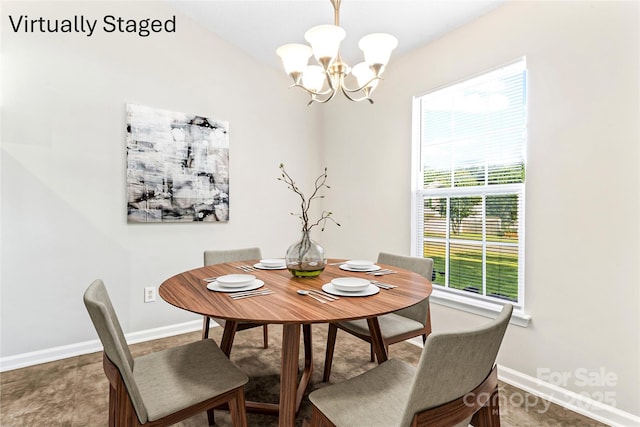 8724 Tweedsmuir Glen Ln, Charlotte, NC 28215 - dining space with a chandelier and baseboards