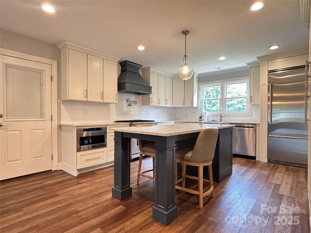 1335 33rd Avenue Dr NE, Hickory, NC 28601 - kitchen featuring custom exhaust hood, stainless steel appliances, dark wood-type flooring, white cabinetry, and recessed lighting