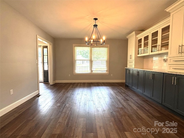 1335 33rd Avenue Dr NE, Hickory, NC 28601 - unfurnished dining area featuring a chandelier and dark wood-style flooring