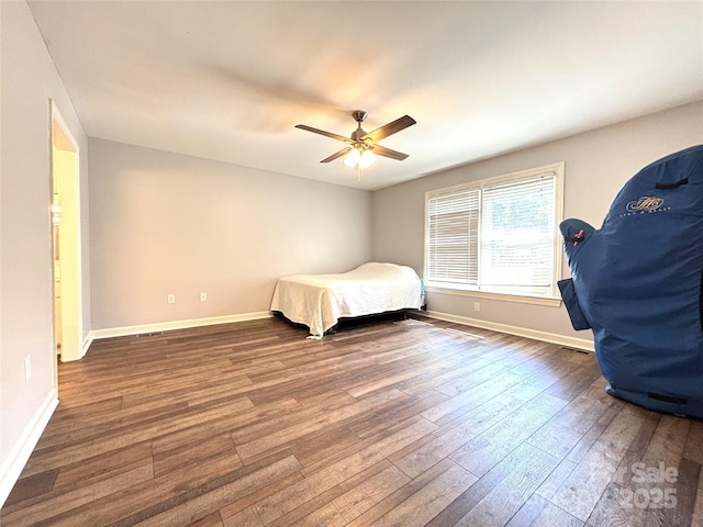 1335 33rd Avenue Dr NE, Hickory, NC 28601 - bedroom featuring dark wood-style flooring and ceiling fan