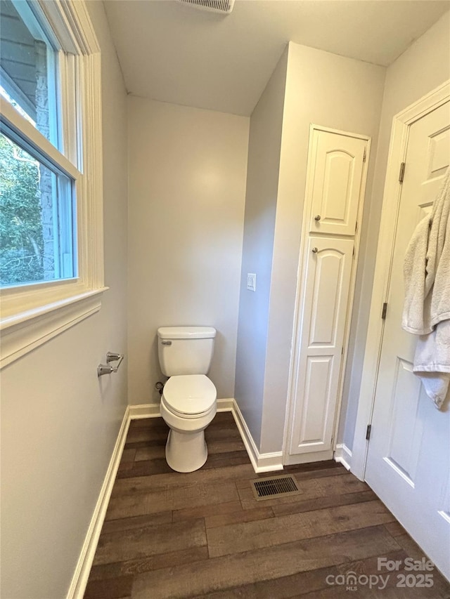 1335 33rd Avenue Dr NE, Hickory, NC 28601 - bathroom featuring wood finished floors and toilet