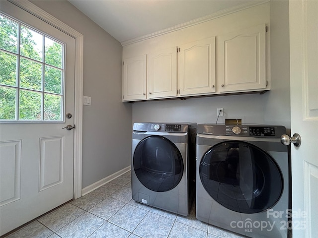 1335 33rd Avenue Dr NE, Hickory, NC 28601 - laundry room with cabinet space, washer and clothes dryer, light tile patterned floors, and crown molding