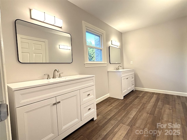 1335 33rd Avenue Dr NE, Hickory, NC 28601 - full bathroom with two vanities and wood finished floors