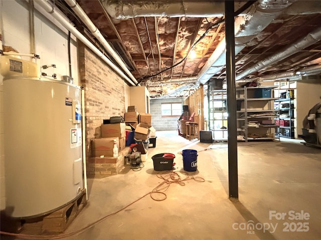 1335 33rd Avenue Dr NE, Hickory, NC 28601 - basement with electric water heater and brick wall