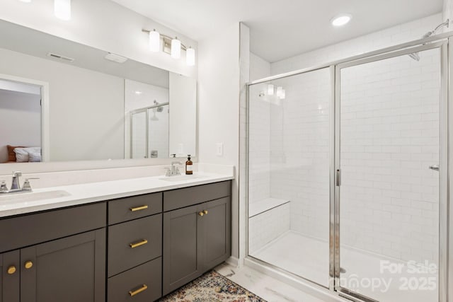 5008 Calvine Mill Way, Charlotte, NC 28205 - ensuite bathroom featuring double vanity, a stall shower, marble finish floors, and recessed lighting