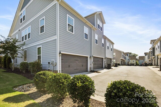 5008 Calvine Mill Way, Charlotte, NC 28205 - view of side of property featuring a residential view and an attached garage