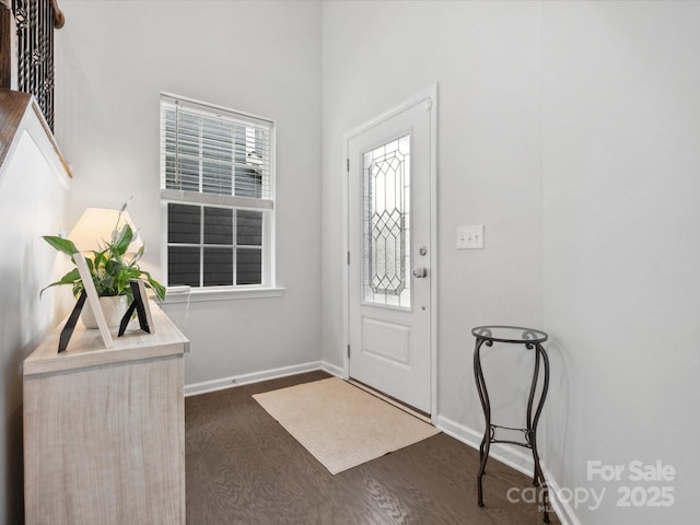1008 Whipcord Dr, Waxhaw, NC 28173 - foyer with dark wood-style floors and baseboards