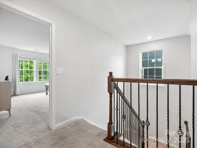 1008 Whipcord Dr, Waxhaw, NC 28173 - hall with an upstairs landing, carpet floors, and recessed lighting