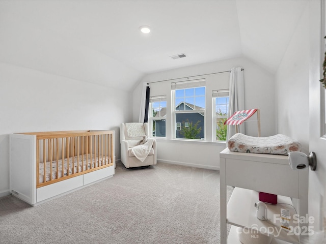 1008 Whipcord Dr, Waxhaw, NC 28173 - carpeted bedroom with lofted ceiling and baseboards