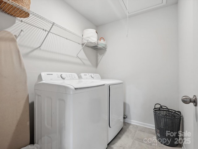 1008 Whipcord Dr, Waxhaw, NC 28173 - laundry area featuring washer and clothes dryer and attic access