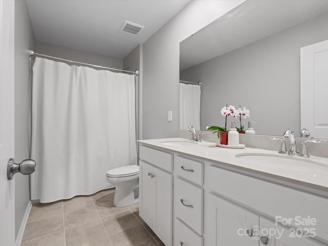 1008 Whipcord Dr, Waxhaw, NC 28173 - full bath with double vanity and tile patterned flooring