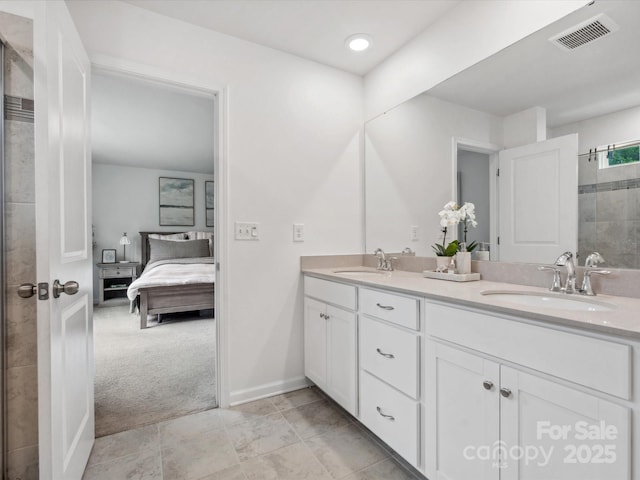 1008 Whipcord Dr, Waxhaw, NC 28173 - ensuite bathroom featuring double vanity and tile patterned flooring