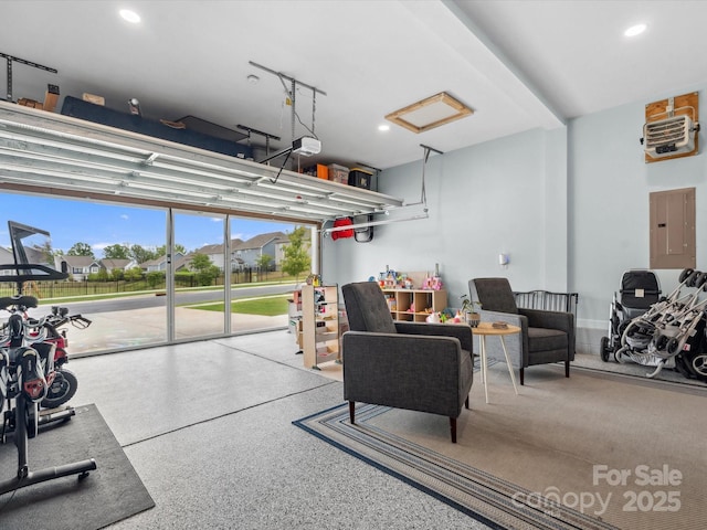 1008 Whipcord Dr, Waxhaw, NC 28173 - garage featuring a garage door opener, electric panel, recessed lighting, and a heating unit