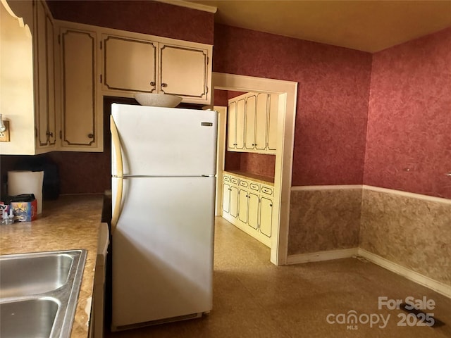 3985 1st Ave SW, Hickory, NC 28602 - kitchen featuring freestanding refrigerator and light countertops