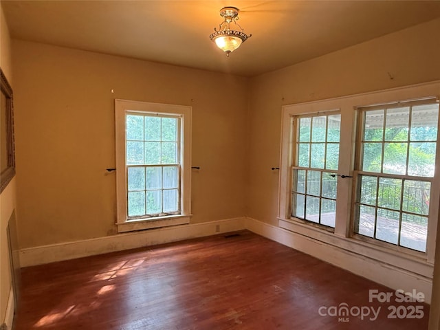3985 1st Ave SW, Hickory, NC 28602 - unfurnished room with wood finished floors and baseboards