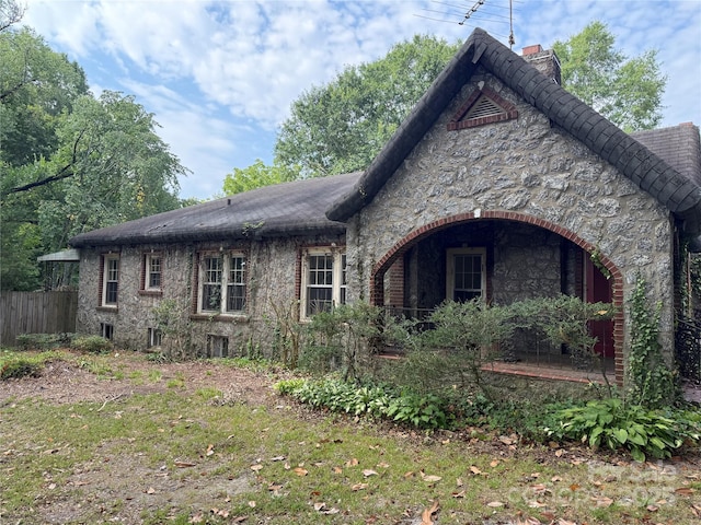 3985 1st Ave SW, Hickory, NC 28602 - rear view of house featuring stone siding and a chimney