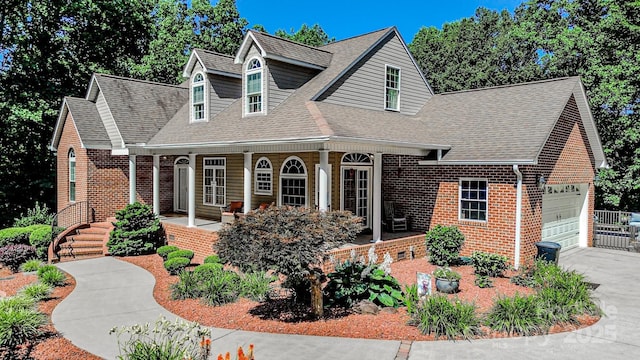 133 Sassafras Hill Dr, Rutherfordton, NC 28139 - cape cod-style house with brick siding, a shingled roof, a garage, and a porch