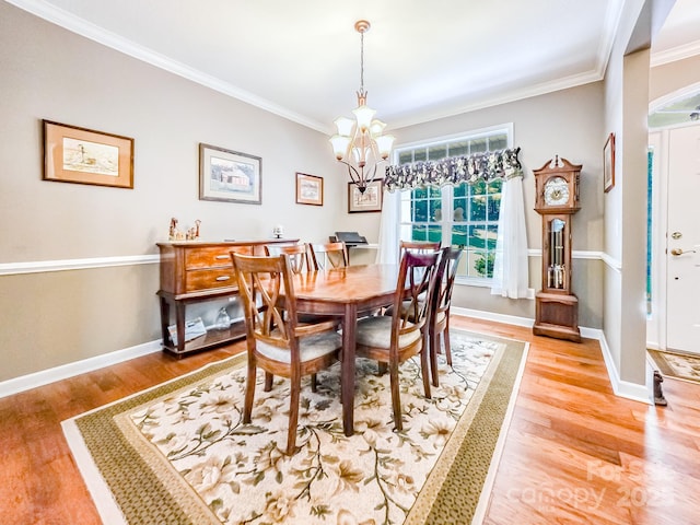 133 Sassafras Hill Dr, Rutherfordton, NC 28139 - dining area featuring ornamental molding, light wood-style flooring, and a chandelier