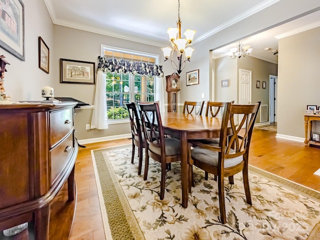 133 Sassafras Hill Dr, Rutherfordton, NC 28139 - dining area with a chandelier, light wood finished floors, and crown molding