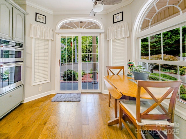 133 Sassafras Hill Dr, Rutherfordton, NC 28139 - dining space with ornamental molding, light wood-style floors, and ceiling fan