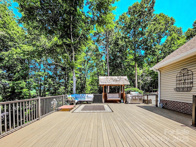 133 Sassafras Hill Dr, Rutherfordton, NC 28139 - wooden terrace with an outdoor living space and view of wooded area