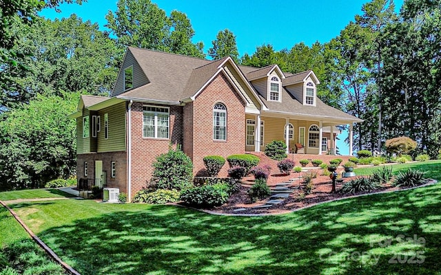 133 Sassafras Hill Dr, Rutherfordton, NC 28139 - new england style home with brick siding, a front lawn, and a porch