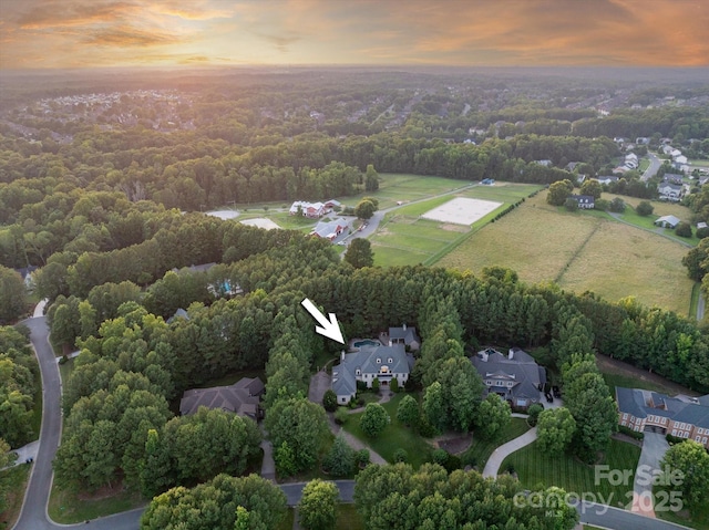 9110 Woodhall Lake Dr, Waxhaw, NC 28173 - aerial view at dusk of a residential view