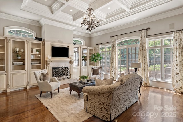 9110 Woodhall Lake Dr, Waxhaw, NC 28173 - living area featuring coffered ceiling, a premium fireplace, beamed ceiling, ornamental molding, and a chandelier