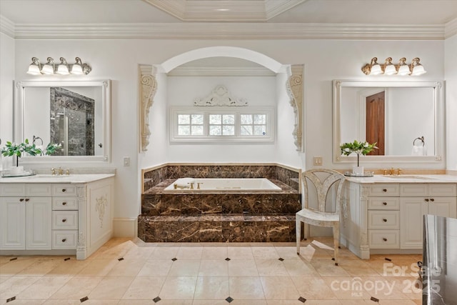 9110 Woodhall Lake Dr, Waxhaw, NC 28173 - full bath featuring a bath, two vanities, crown molding, and tile patterned floors