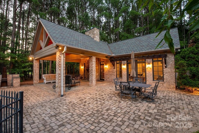 9110 Woodhall Lake Dr, Waxhaw, NC 28173 - view of patio with outdoor dining area and an outdoor living space