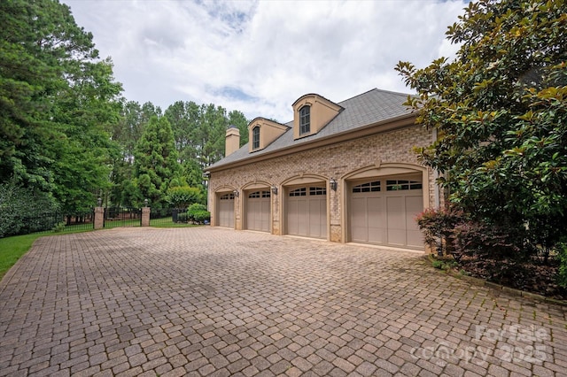 9110 Woodhall Lake Dr, Waxhaw, NC 28173 - garage with decorative driveway
