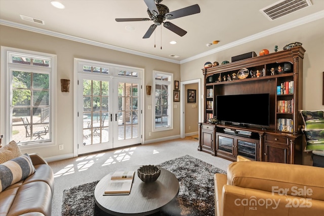 9110 Woodhall Lake Dr, Waxhaw, NC 28173 - living room featuring light carpet, ornamental molding, a ceiling fan, french doors, and recessed lighting