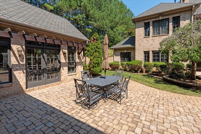 9110 Woodhall Lake Dr, Waxhaw, NC 28173 - view of patio / terrace with outdoor dining space and french doors