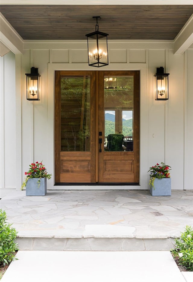 48 Falling Leaves Ln, Hendersonville, NC 28792 - doorway to property with board and batten siding