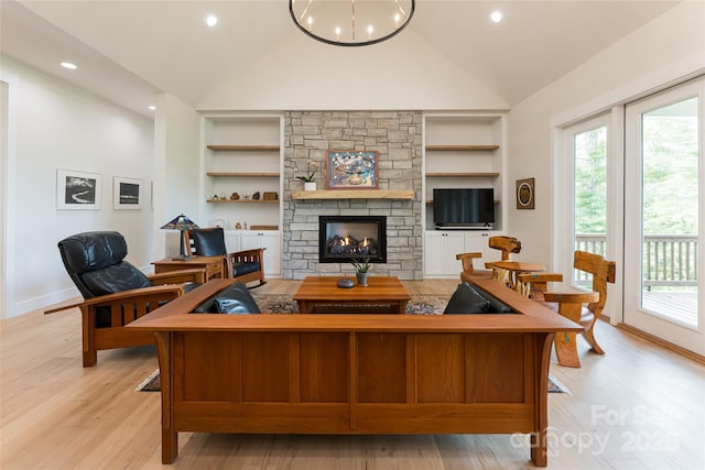 48 Falling Leaves Ln, Hendersonville, NC 28792 - living room featuring built in features, healthy amount of natural light, light wood-style flooring, recessed lighting, and high vaulted ceiling
