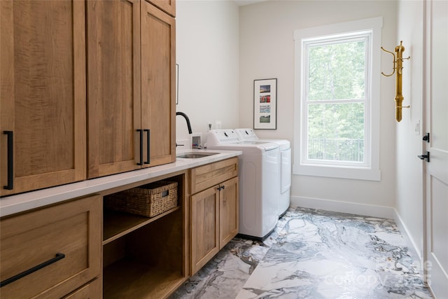 48 Falling Leaves Ln, Hendersonville, NC 28792 - laundry area featuring light marble finish flooring, cabinet space, and independent washer and dryer