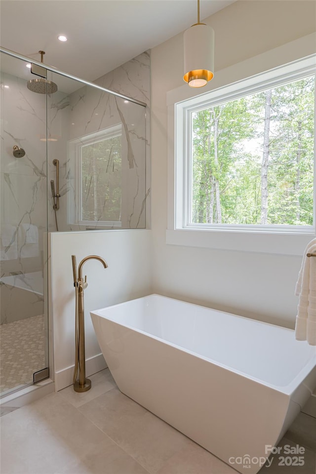 48 Falling Leaves Ln, Hendersonville, NC 28792 - bathroom with a marble finish shower, a soaking tub, tile patterned flooring, and recessed lighting